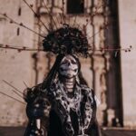Woman in traditional Day of the Dead attire in Oaxaca, Mexico.